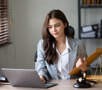 lawyer working on a laptop.