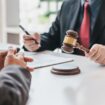 Business people and lawyers talk and contract together. Signing of a contract in the presence of an