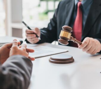 Business people and lawyers talk and contract together. Signing of a contract in the presence of an